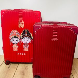 Lote x2 valijas roja con diseño + roja lisa