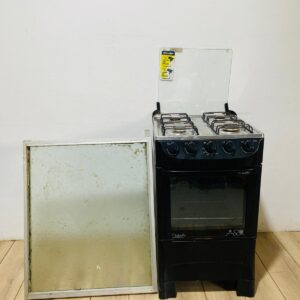 Cocina a gas marca Mueller + campana en acrílico