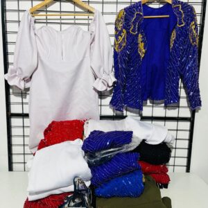 Lote x26 prendas de fiesta: vestidos, chaquetas, pollera y otros