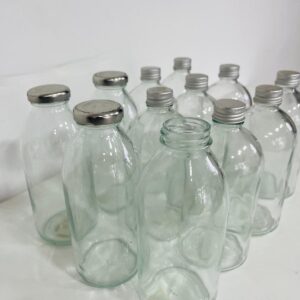 Lote x12 botellas de vidrio con tapa, diferentes